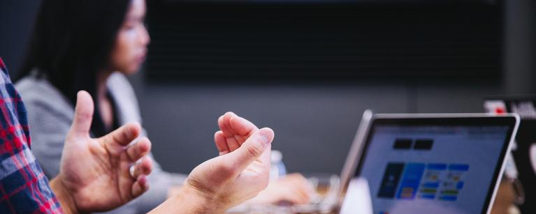 people chatting together at a table