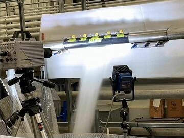 Flowing burst test of pipe showing a pinhole-to-rupture failure event