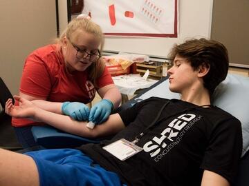 Blood being drawn from a SHRed participant.
