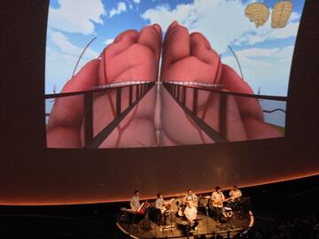 Giant Walkthrough Brain Performance at TELUS Spark