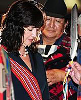 Yvonne Poitras Pratt in ceremony with Treaty 7 Elders at the 2011 Aboriginal Graduation community event at the University of Calgary.