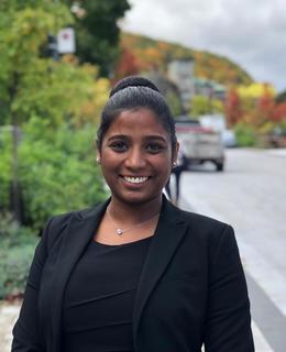 A women posing for a headshot