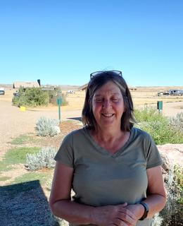 Ann Levey with prairie in background