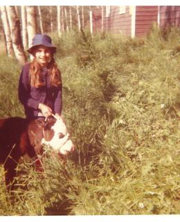 Young Dr. During with a young cow