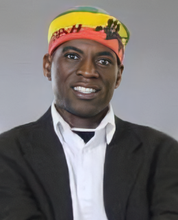 Professional headshot of Caesar smiling against a grey backdrop.