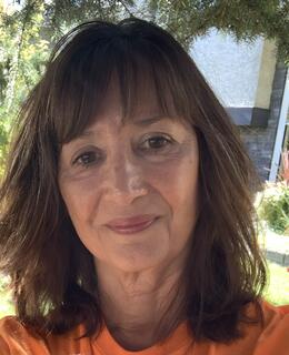Yvonne wearing Orange Shirt Sept 30 2021