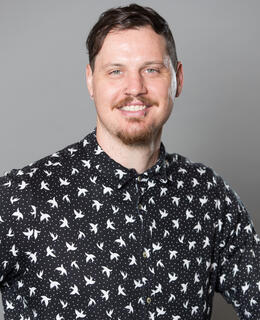 Man in black and white shirt