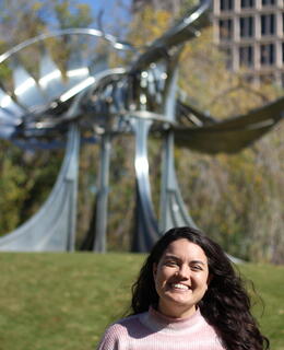 Paloma in front of the "Prairie Chicken" Sculpture at University of Calgary