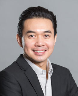 Headshot photo of Tommy Nguyen