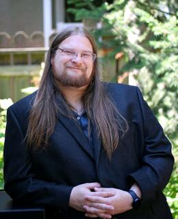 I'm smiling at the camera. What a great beard!