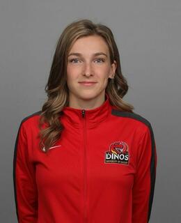 Headshot in red varsity track suit