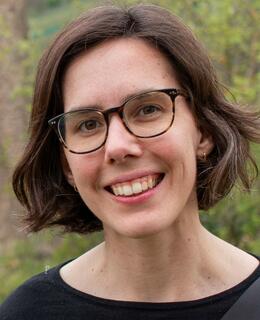 Photograph of woman with brown eyes and brown hair