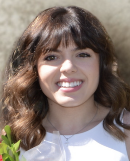 A headshot of Eva Paolucci