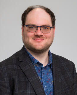 A one-quarter head shot of Curtis Frederick.