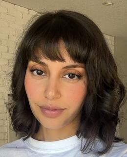 picture of iman with short brown hair