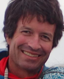 Headshot of Warren Wilson smiling.